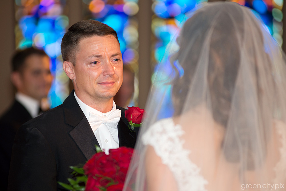 groom crying at wedding