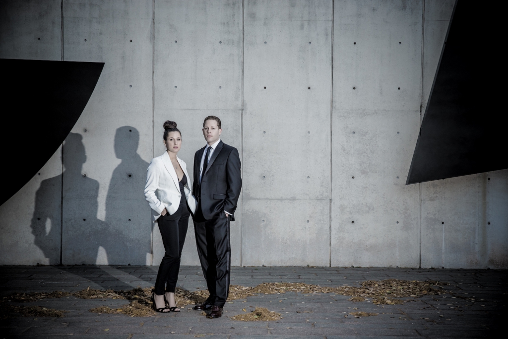 man and woman posing at the museum district in houston