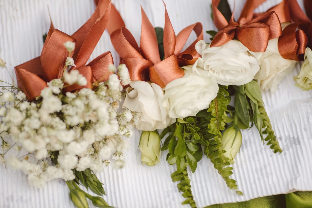 bridesmaid bouquets with white roses, queen anne’s lace, and greenery ties with silk ribbons