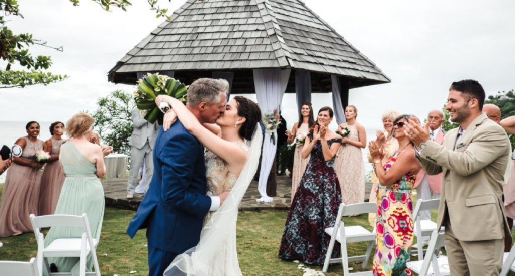 bride and groom kissing outside at Cap Maison Resort in St. Lucia