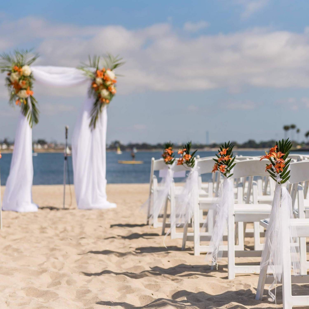 wedding ceremony setup on the beach at catamaran resort hotel and spa in san diego