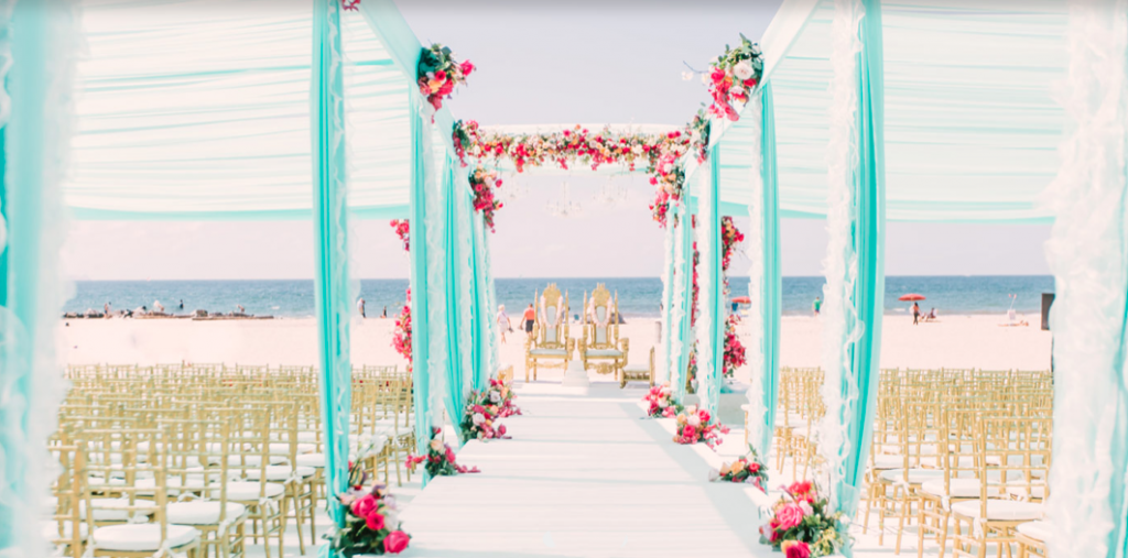 wedding ceremony set up on the beach at the hotel del coronado in san diego