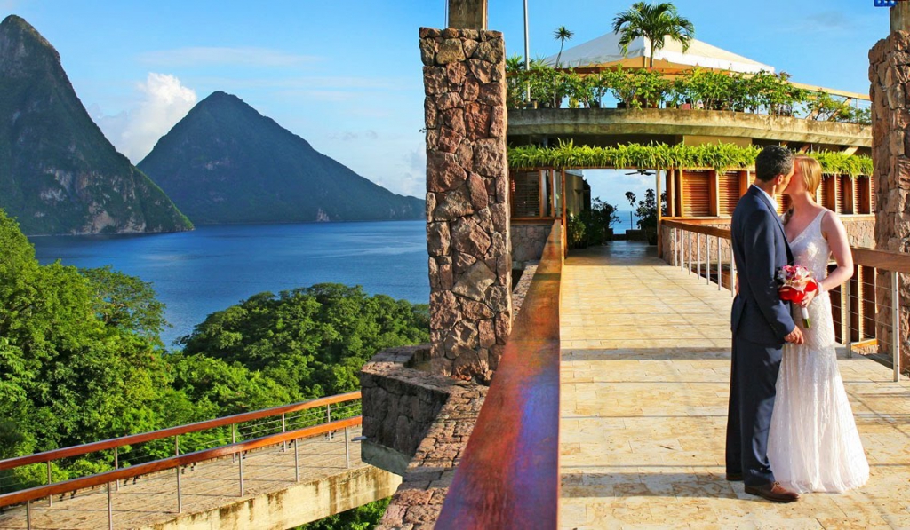 bride and groom kissing outside at St. Lucia’s Jade Mountain Resort