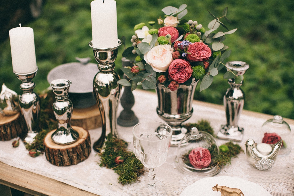 Silver candlesticks and berry decor