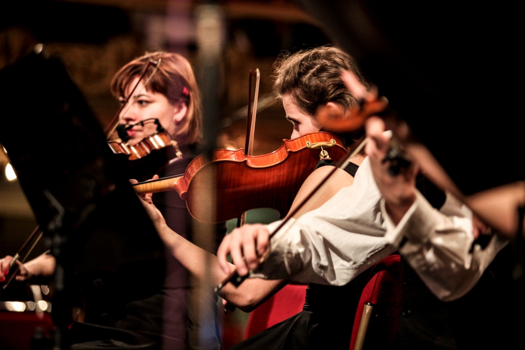 musicians playing violin
