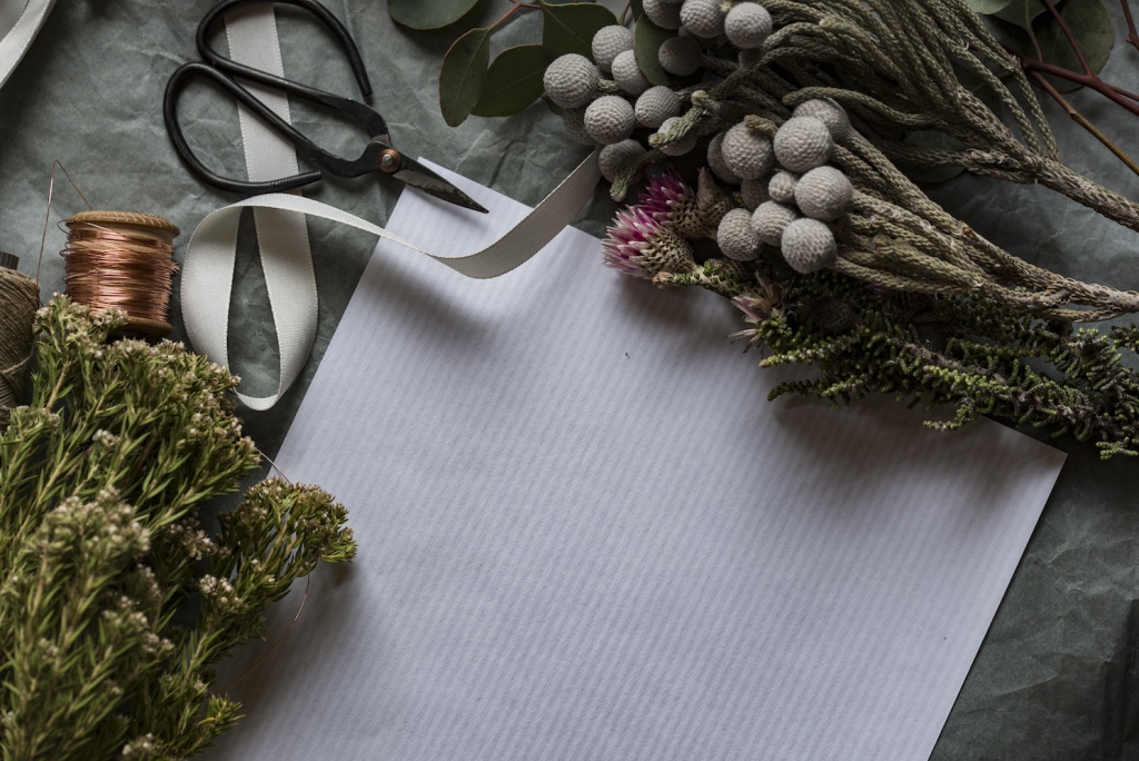 diy winter wedding flowers setup with scissors and ribbon
