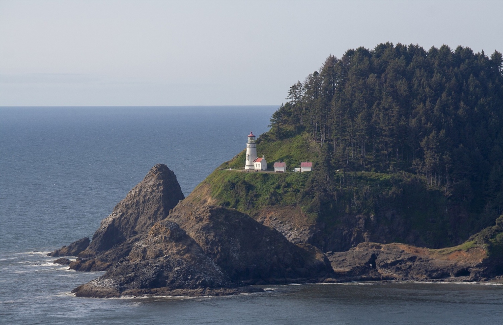 heceta head lighthouse on a cliff along oregon coast