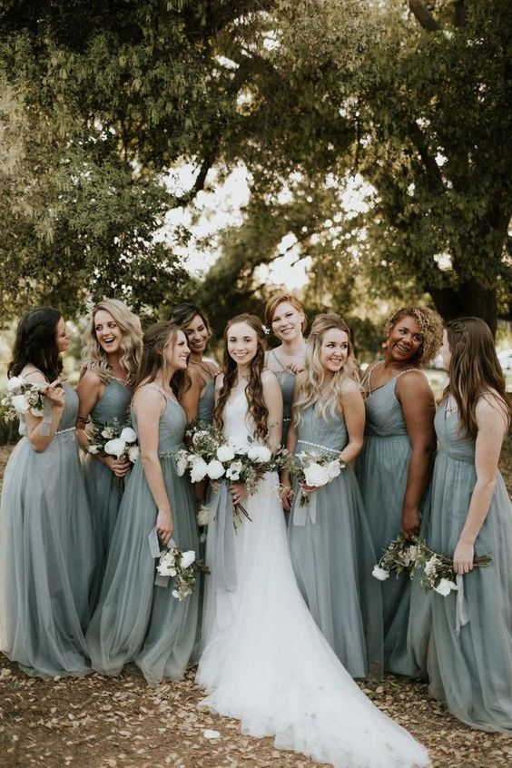 Bridal party in sage green spring wedding colors