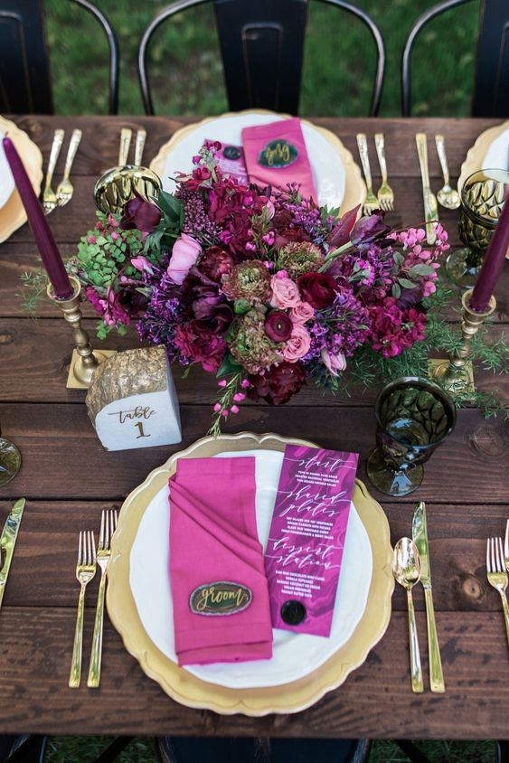 Rich berry hues and gold wedding colors