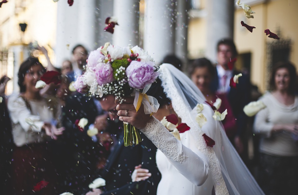 Beautiful bride with bouquet of flowers